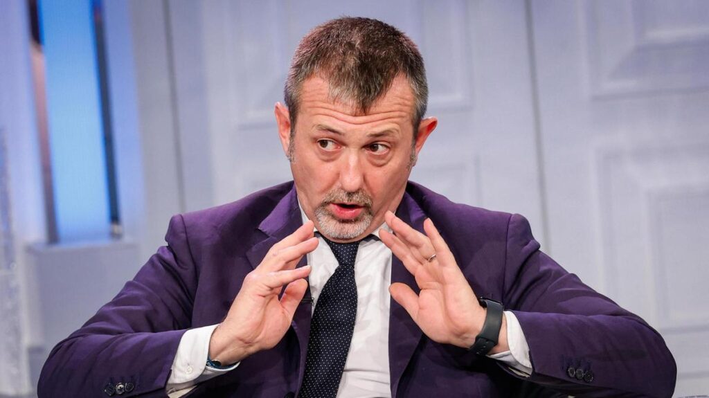 Interrogatorio di Mauro Caroccia su beneficenza e legami con l'ex sottosegretario Delmastro