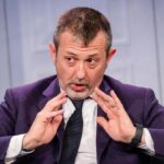 Interrogatorio di Mauro Caroccia su beneficenza e legami con l'ex sottosegretario Delmastro