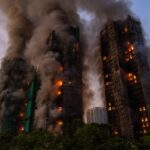 Sette persone e due aziende accusate per l'incendio mortale nei grattacieli di Hong Kong del novembre scorso