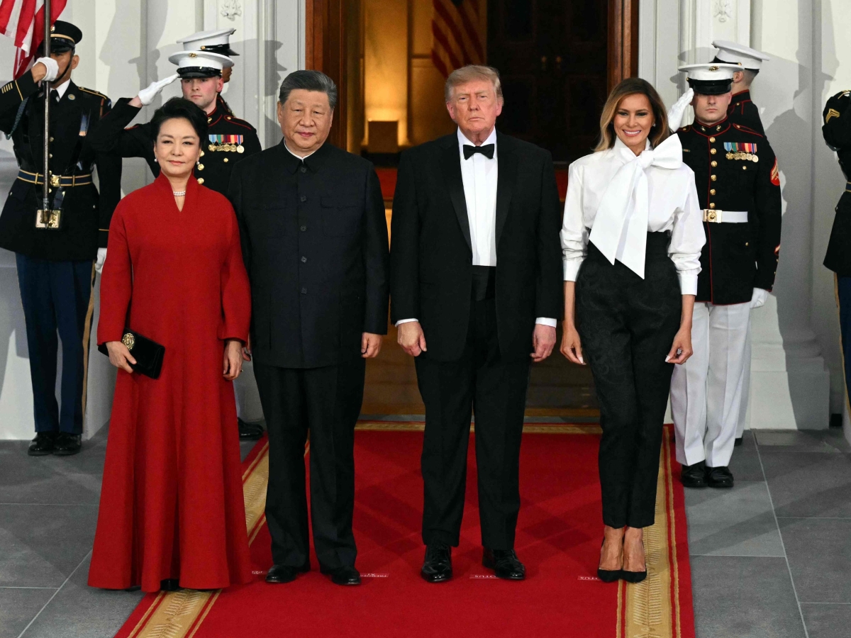 Le first lady alla cena di stato tra Trump e Xi: la moda ruba la scena